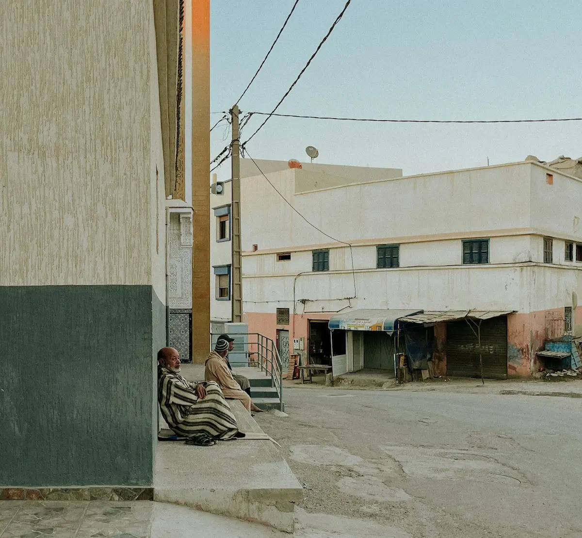 Quiet street in Tamraght Morocco showing local architecture and slow everyday village rhythm